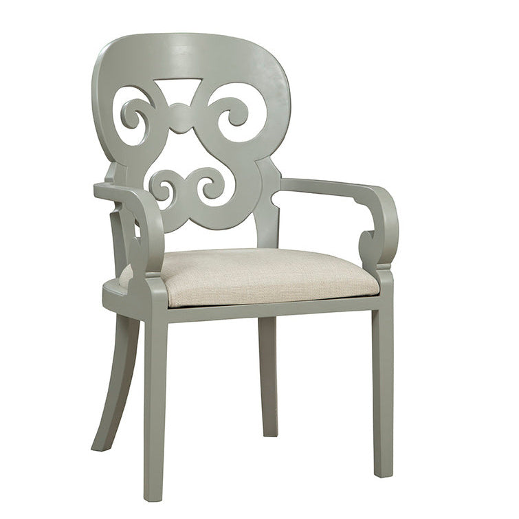 Gray armchair with decorative backrest and beige cushion. VINTAGE STYLE GREY DINING CHAIR FOR SALE